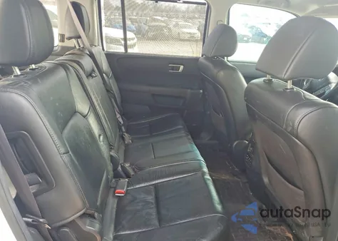 2014 Honda Pilot Touring z USA, uszkodzony, nr VIN 5FNYF4H91EB009052